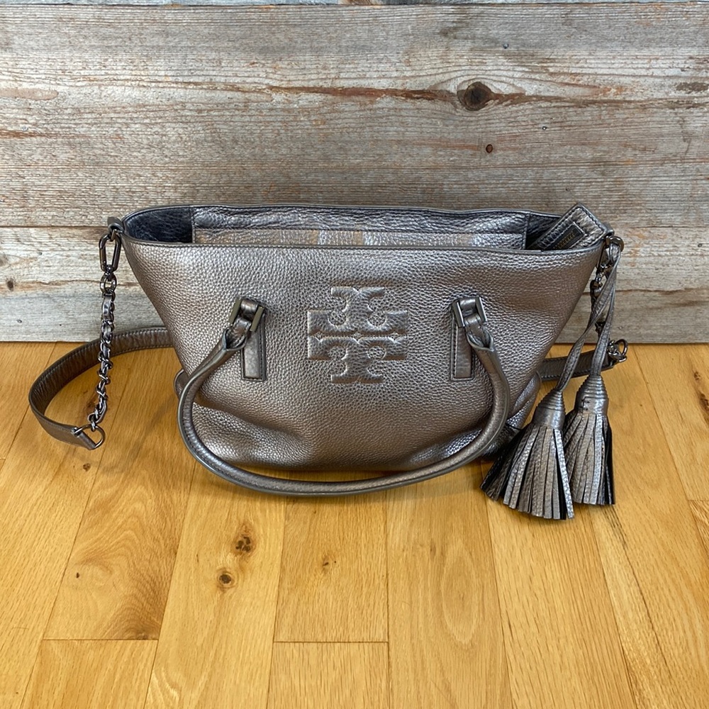 Tory Burch metallic purse with removable straps and tassel